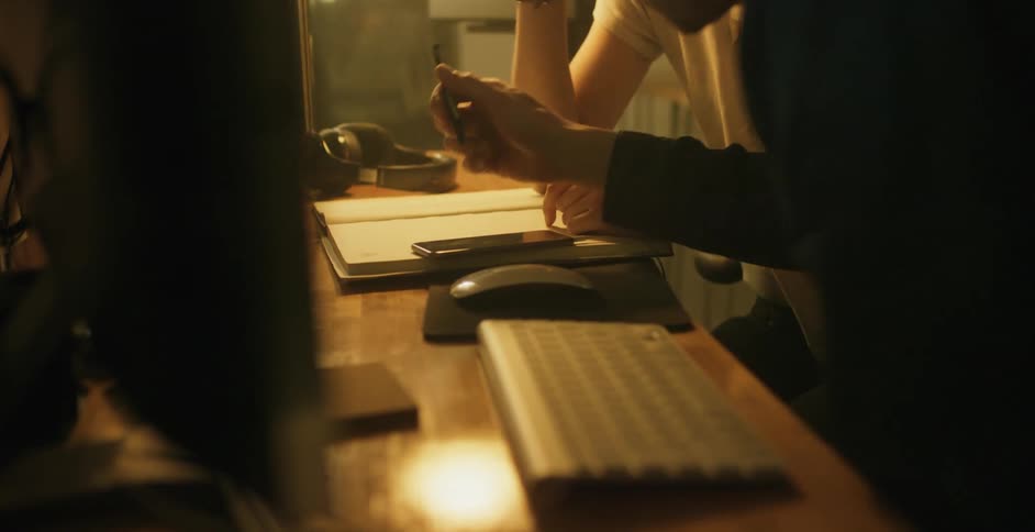 A person writing on paper