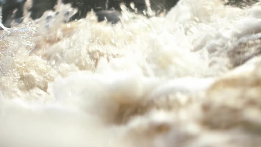 River water flowing over rapids in nature