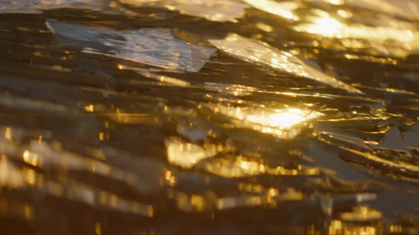 Ice and water with sunlight reflecting off of it