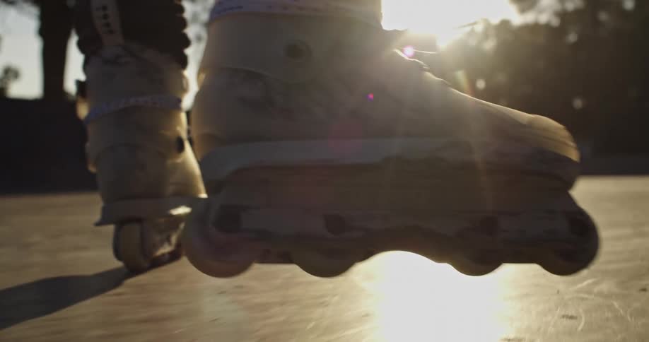 A person roller blading at a skate park