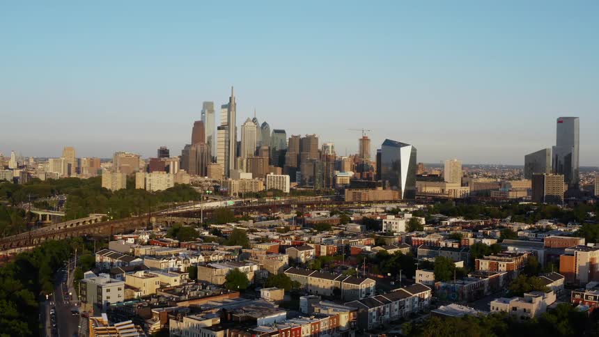A bridge separates downtown Philadelphia from urban neighborhoods
