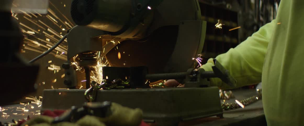 An employee is working in a machine warehouse