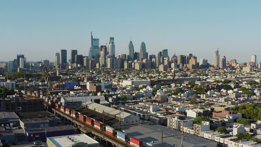 Aerial view of a downtown city is displayed at midday