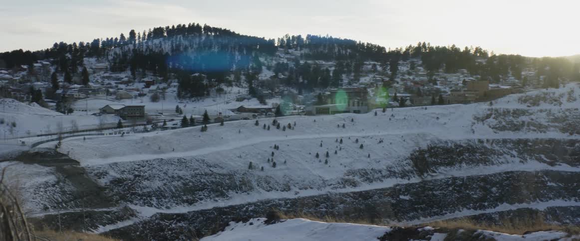 A view of a mountain with snow on it