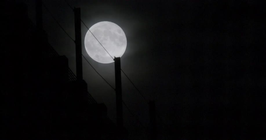 A full moon in the night sky