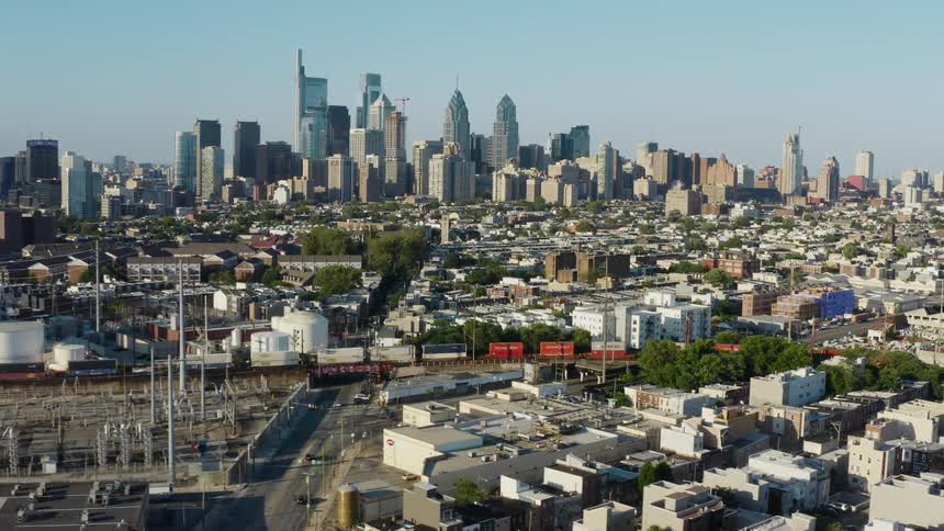 The buildings of a metropolis under a clear daytime sky