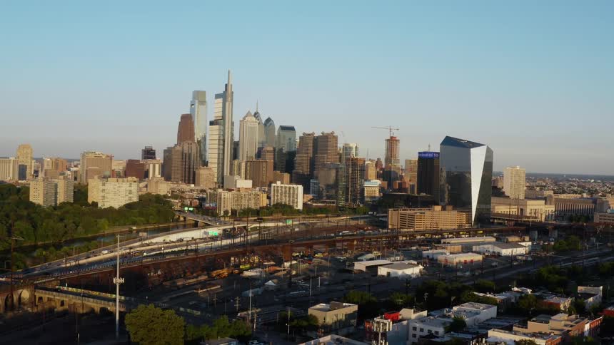 An aerial view of a downtown city is displayed