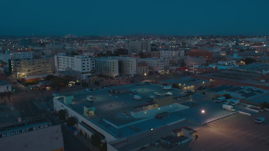The sun is nearly set on the city