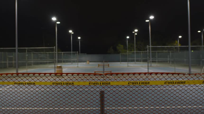 A view of an empty sports court at night