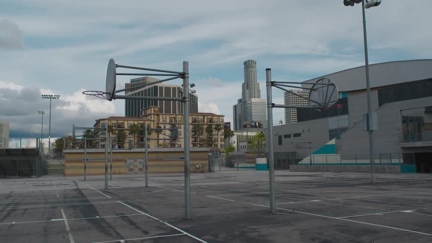 A basketball court in empty ina downtown city