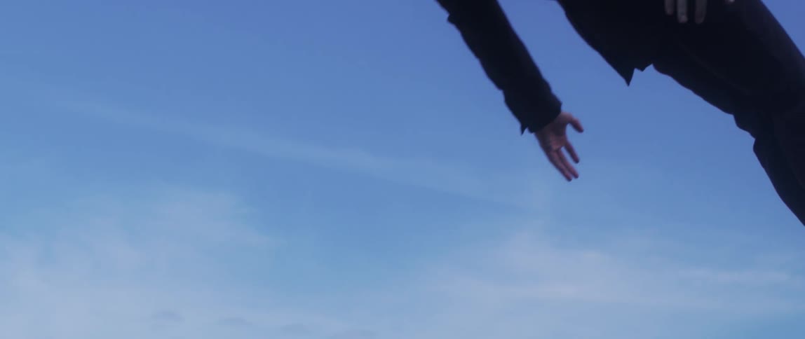 Surreal footage of a young boy falling backwards in mid air