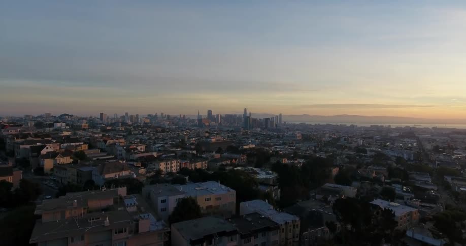 A large city spread out with a lot of tall skyscrapers clumped together