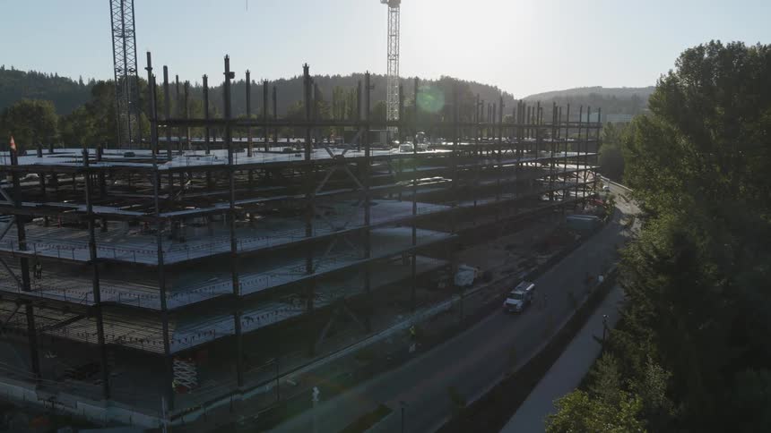 Steel columns and girders make up the framework of a new building under construction