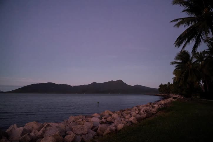 A time lapse of a sunset at a beach