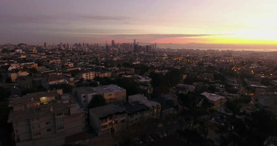 Aerial view of a town at sunset