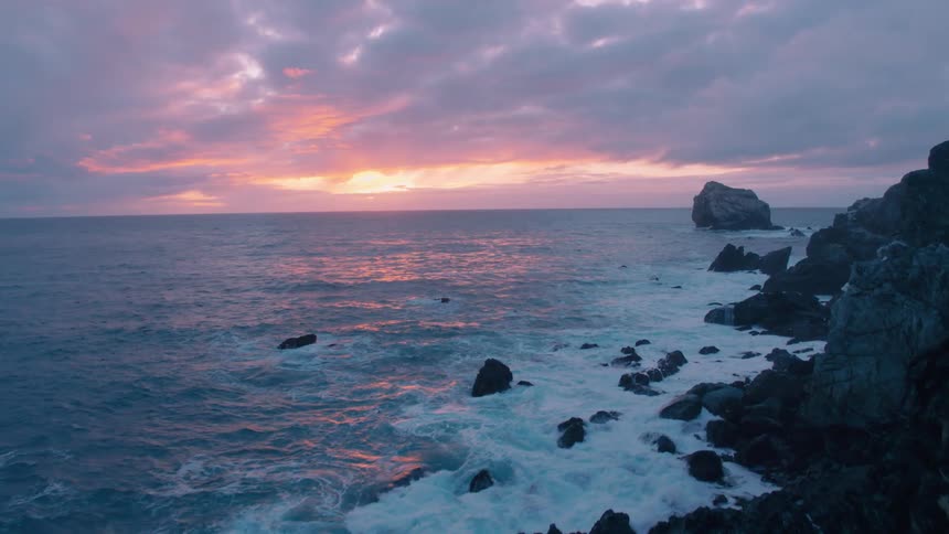 Ocean waves breaking on a rocky coast
