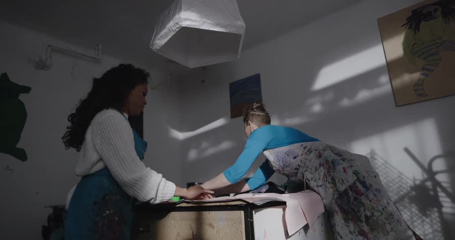 Females folding clothes