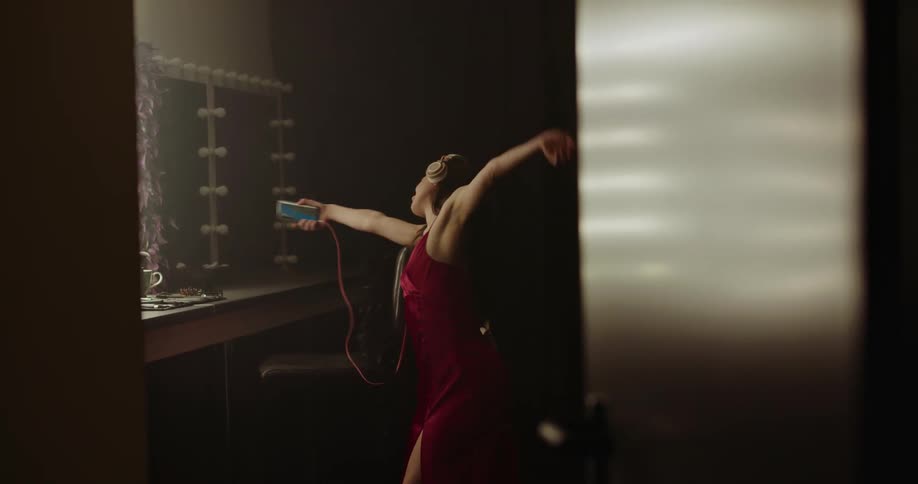 Woman dancing to music