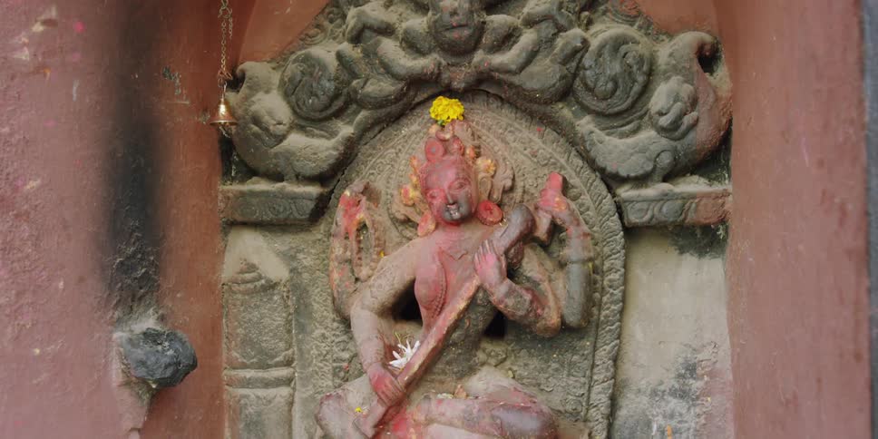 Close up of a stone carving near a wall