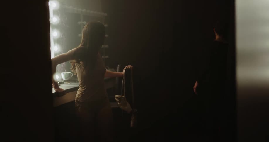 Dance instructor and woman quarrel with each other in the dressing room