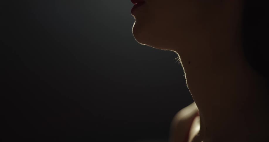 Side view of female dancer performers breathing on the stage