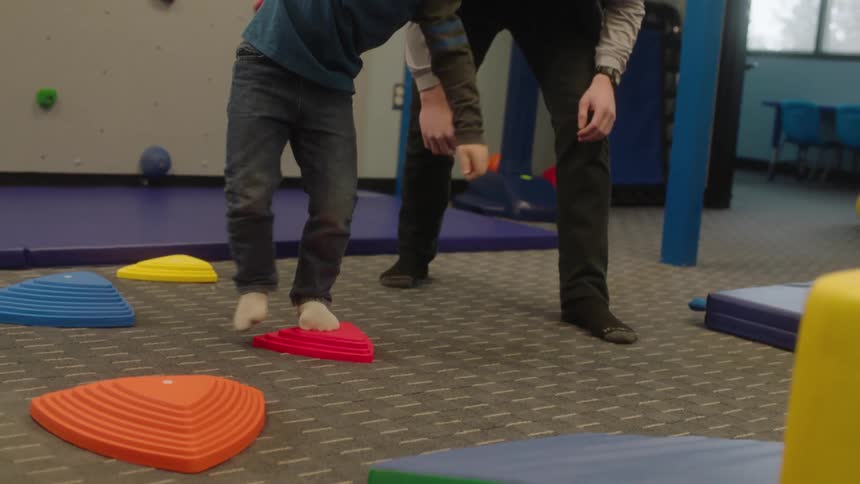 A child playing with raised blocks
