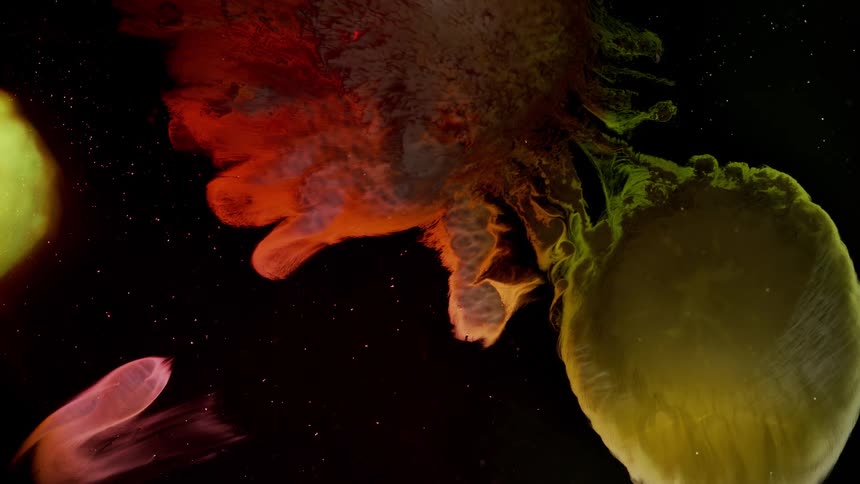 Various colors of smoke spread in the night sky