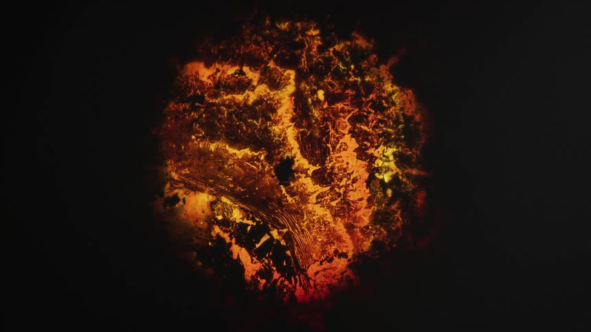 Aerial top dow view of red hot glowing magma on a volcano crater