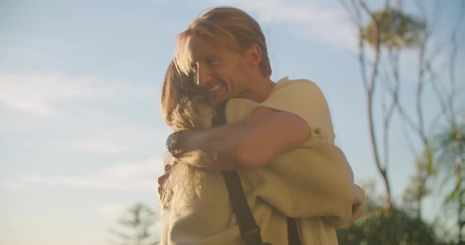 A man and woman hugging