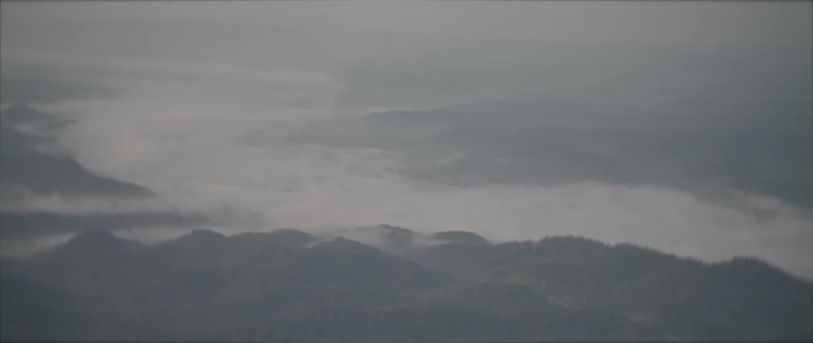 Aerial view of the cloud layer over the mountain peaks