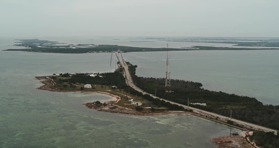 Cars traveling over roads and bridges spanning islands
