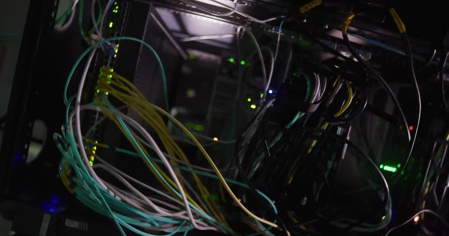 Wires wind around the networking equipment