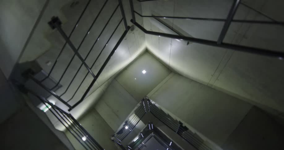 A person walking in a stairwell