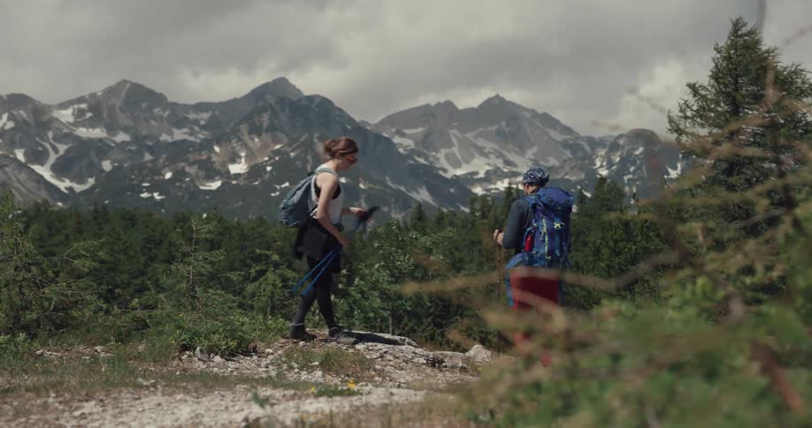 Woman and male walking