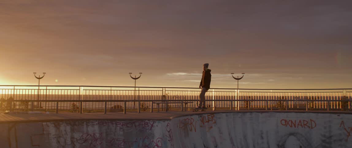 A man that is skateboarding at a park