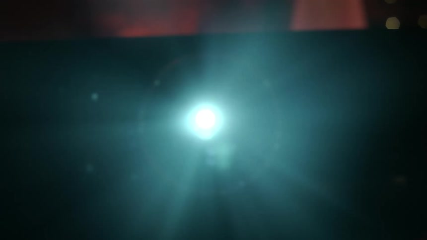 A view of a flashlight at night outdoors