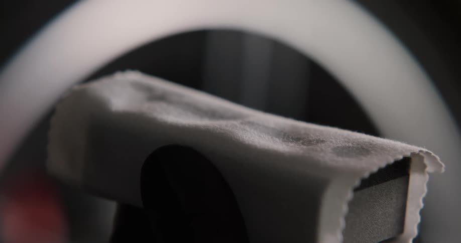 A view of water dropping onto a sponge with a towel