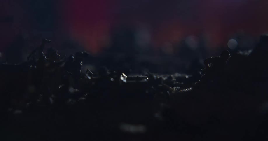 Toy army men with smoke and embers