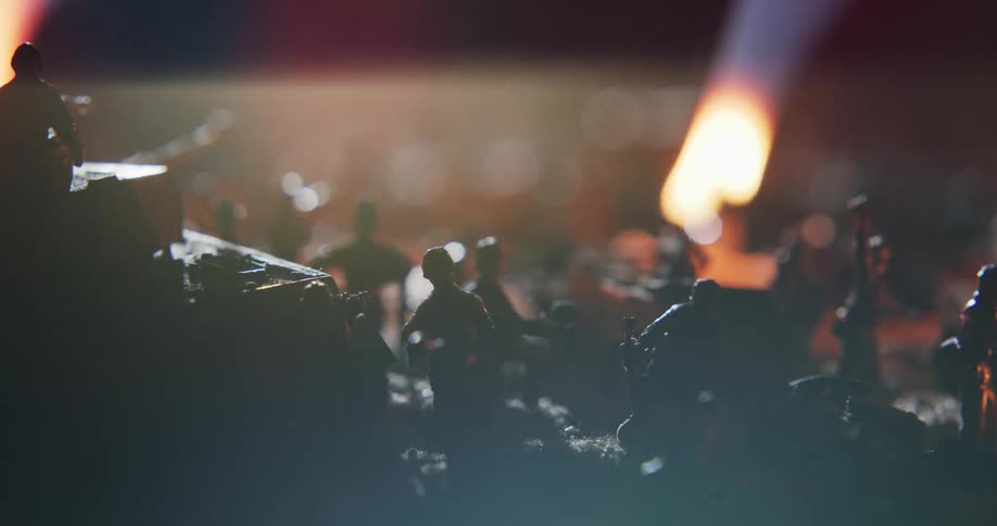 The campfire is burning at night