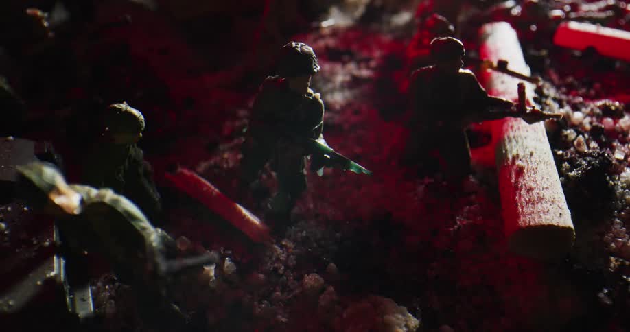 A bunch of toy soldiers set up outdoors