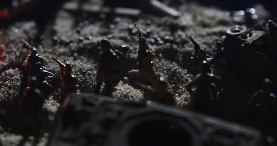 Fire burns near the collection of military toys