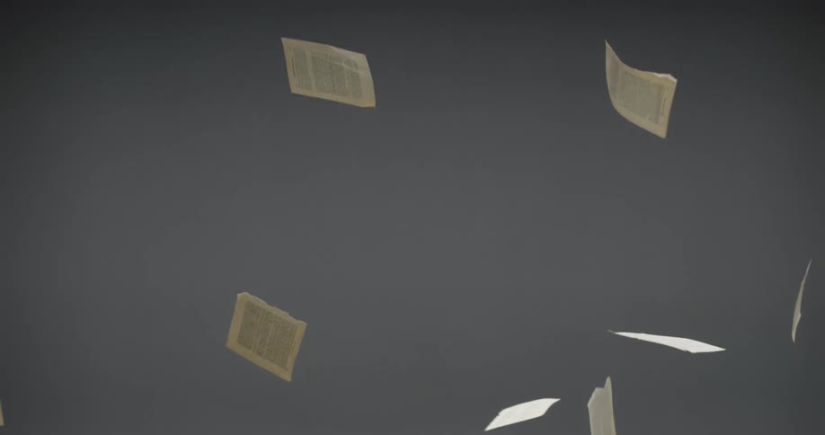 Book pages floating down in the air outdoors against the blue sky