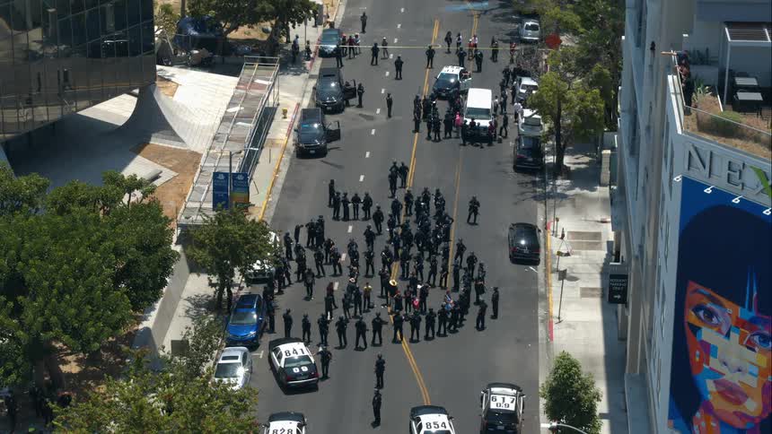 A rally is gathered on the road in the city