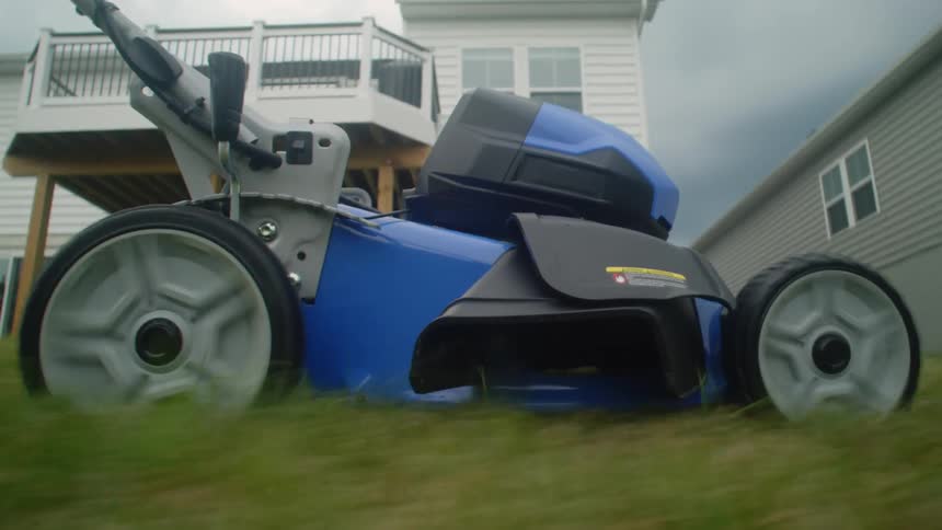 A person is mowing the lawn