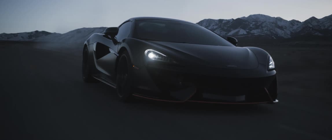 A sports car races on the road