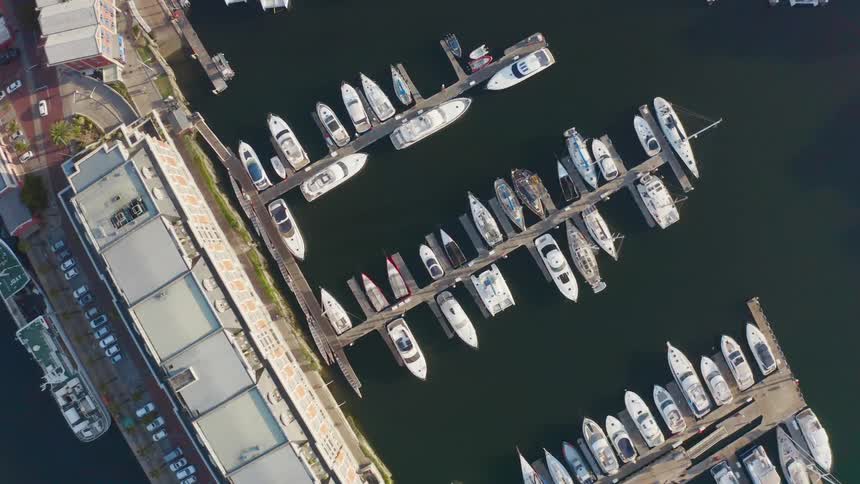 Aerial view of boats docked on a marina at daytime