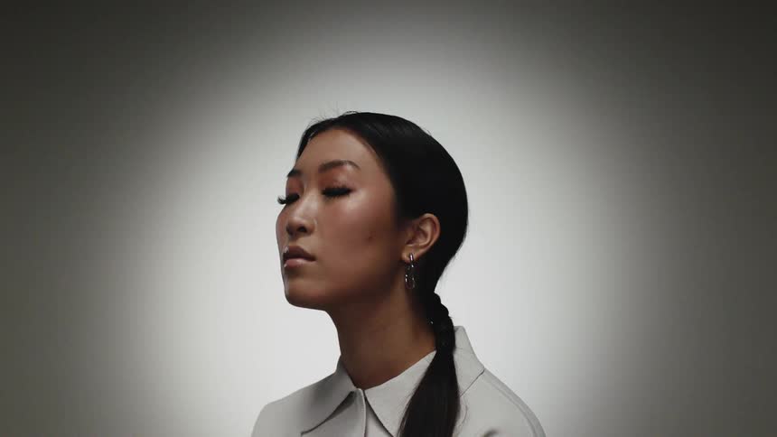 A portrait of a woman in a studio