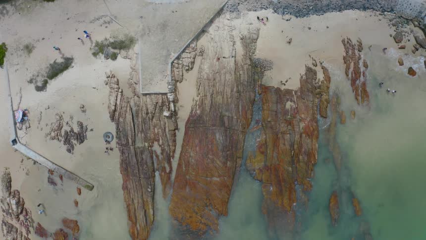 Aerial view of the beach is displayed