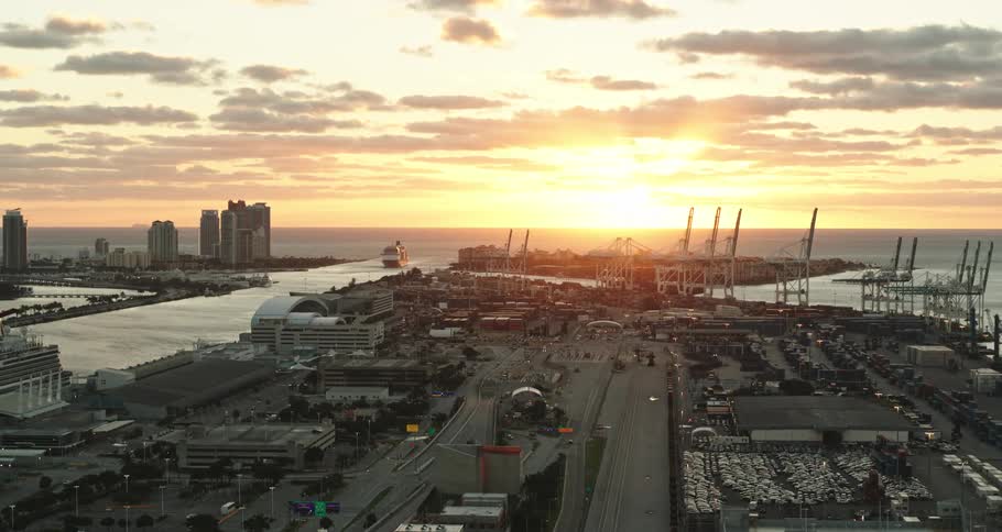 Aerial view of a city is displayed at dusk