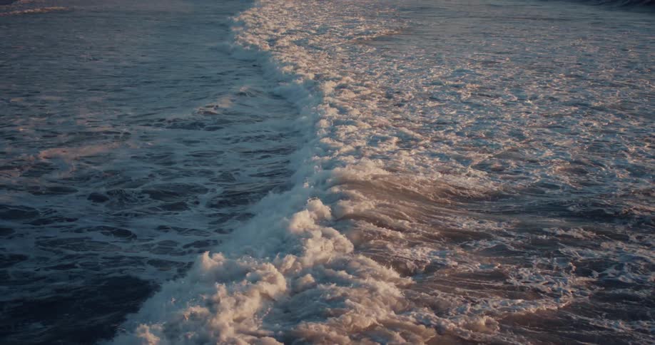 Waves rolling and splashing near land